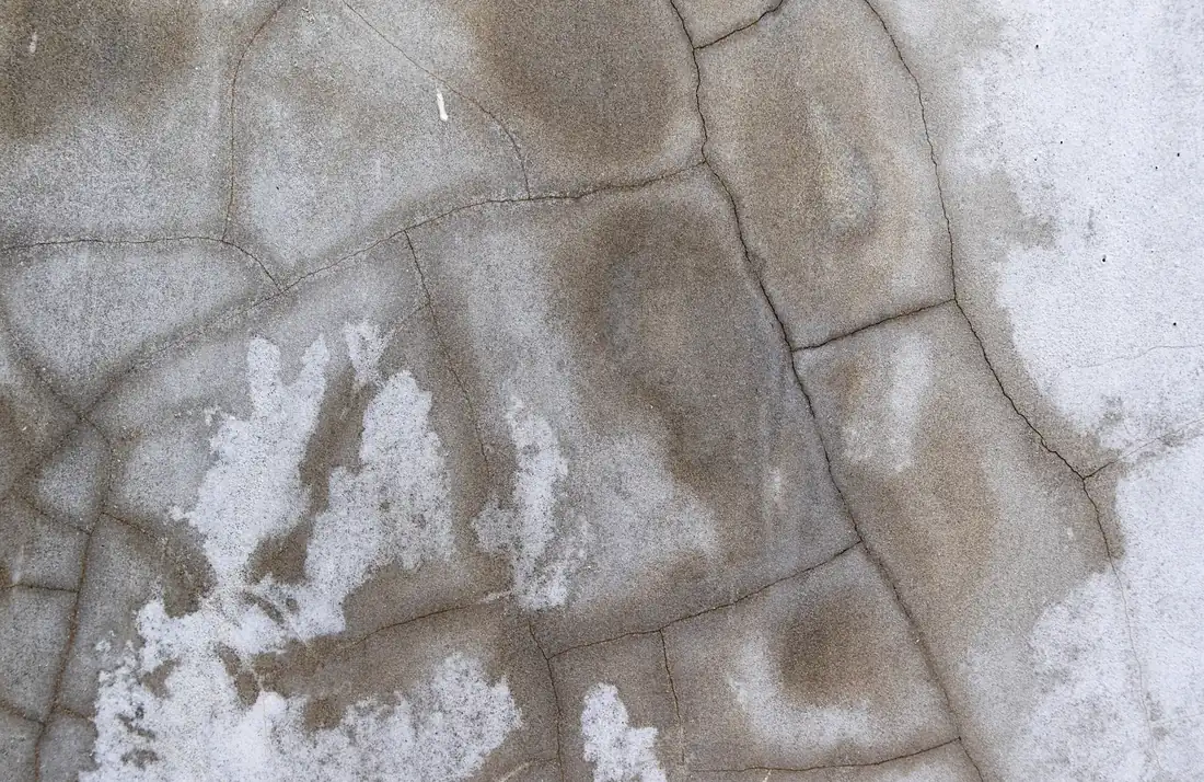 a floor with cracks due to water leakage in Apache Junction